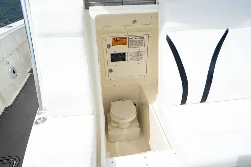 Slide: The Image of 2009 SeaVee 390I boat interior with built-in toilet compartment. - 45