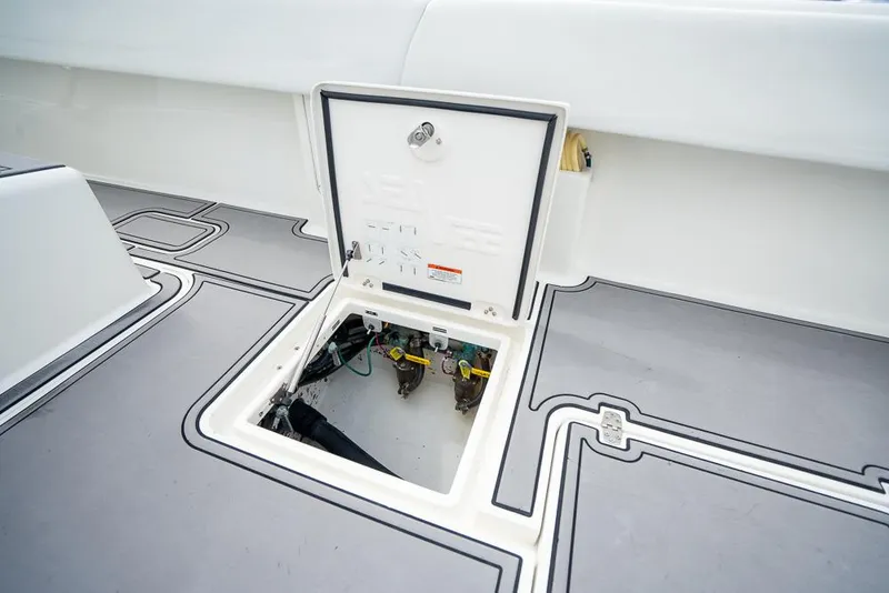 Slide: The Image of 2009 SeaVee 390I boat deck with open hatch showing internal components. - 48
