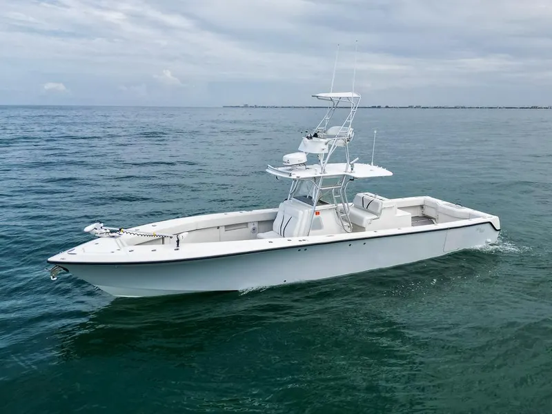 Slide: The Image of 2009 SeaVee 390I boat cruising on open water. - 8