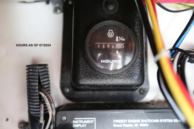 Slide: The Image of Hour meter of 2005 Wellcraft 330 Coastal showing 1396 hours as of 07/2024. - 27