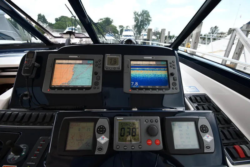Slide: The Image of 2007 Tiara Yachts 4700 Sovran dashboard with navigation and control systems. - 15
