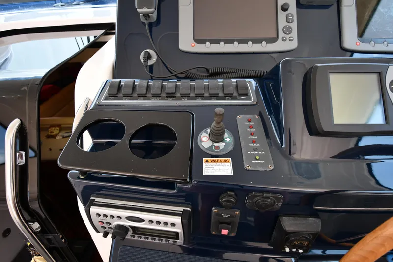 Slide: The Image of Control panel of a 2007 Tiara Yachts 4700 Sovran with navigation equipment. - 16