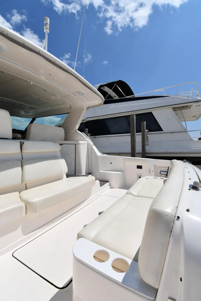 Slide: The Image of 2007 Tiara Yachts 4700 Sovran with spacious white seating area. - 22