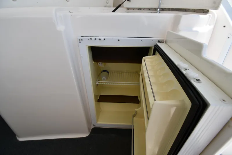 Slide: The Image of Open refrigerator on a 2007 Tiara Yachts 4700 Sovran boat. - 34