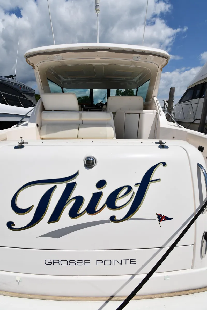 Slide: The Image of 2007 Tiara Yachts 4700 Sovran named Thief docked in Grosse Pointe. - 4