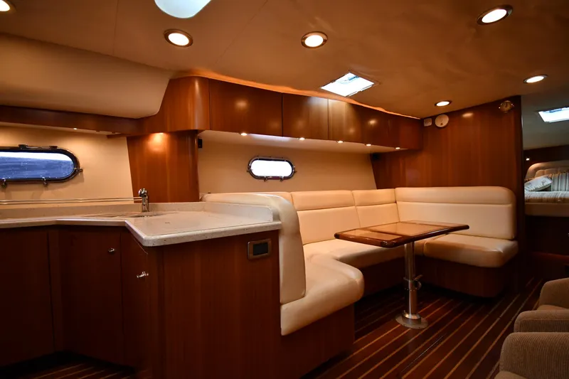 Slide: The Image of 2007 Tiara Yachts 4700 Sovran interior with elegant seating and modern kitchen. - 48