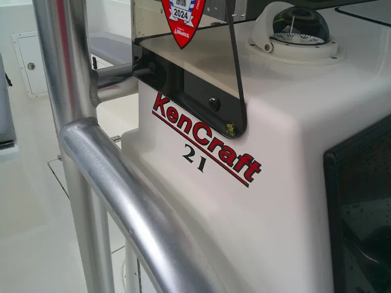 Slide: The Image of KenCraft Challenger 21 boat, 2020 model, close-up of logo and helm area. - 14