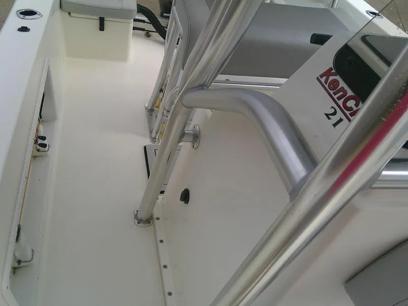 Slide: The Image of 2020 KenCraft Challenger 21 boat interior with seating and railing. - 20