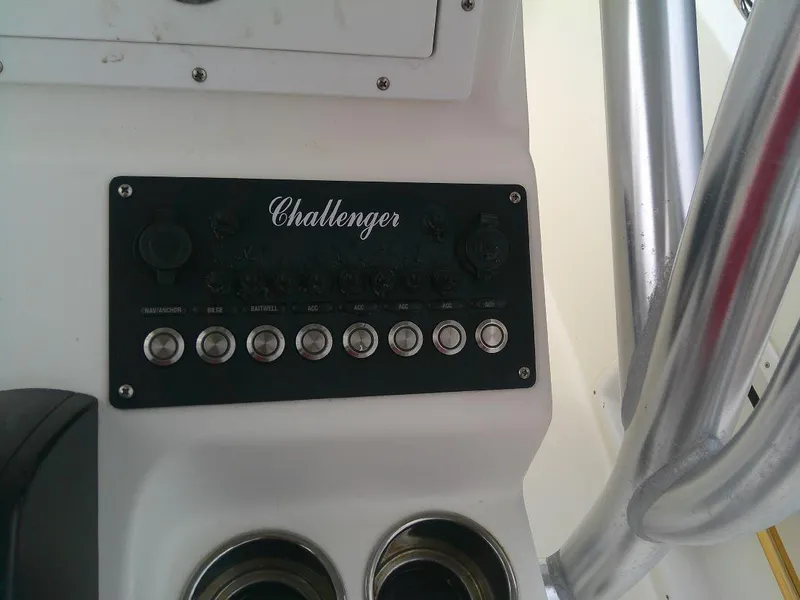 Slide: The Image of Control panel of a 2020 KenCraft Challenger 21 boat. - 24