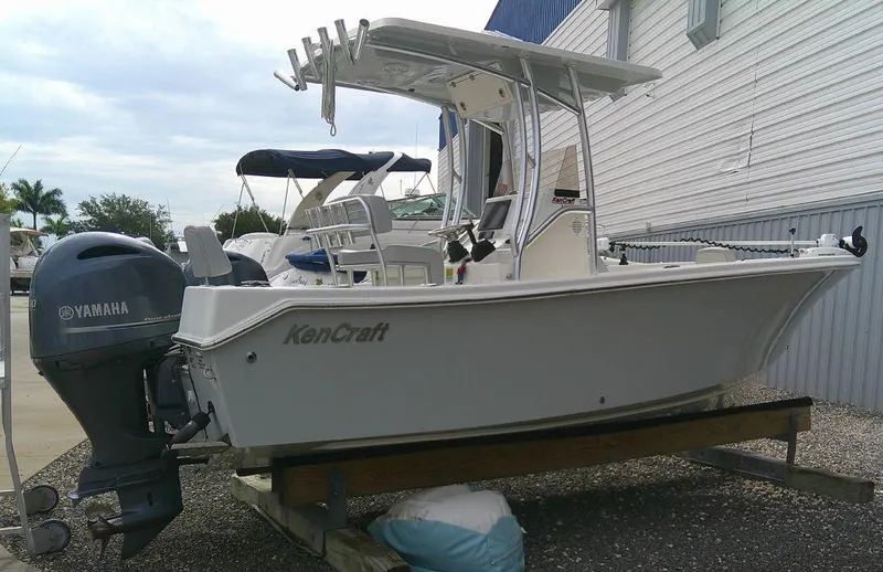Slide: The Image of 2020 KenCraft Challenger 21 boat with Yamaha outboard motor on a trailer. - 3