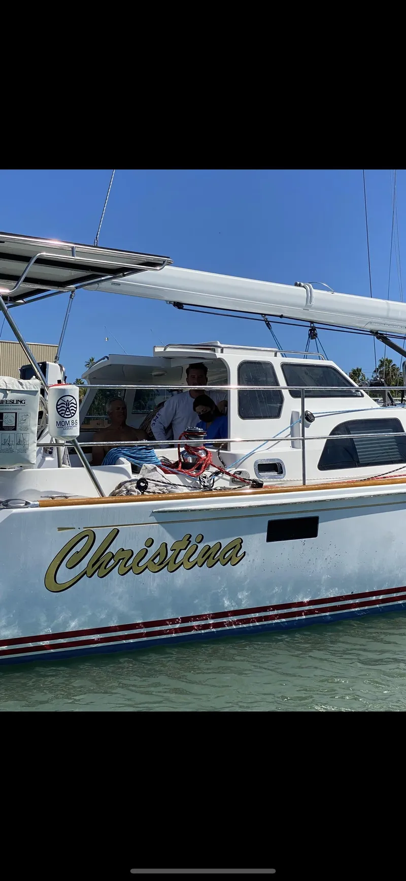 Slide: The Image of Sailboat named "Christina" on water, Morris 486, 2005 model. - 1