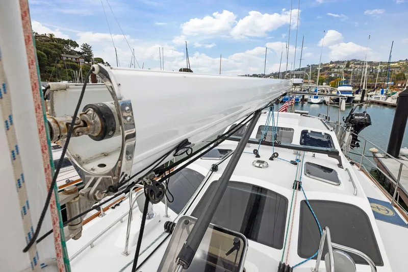 Slide: The Image of Sailboat deck view, Morris 486, 2005 model, docked in a marina with clear skies. - 13