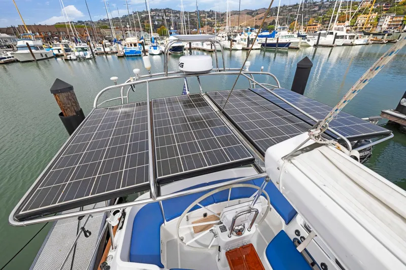 Slide: The Image of Sailboat with solar panels docked in marina, Morris 486, 2005 model. - 22