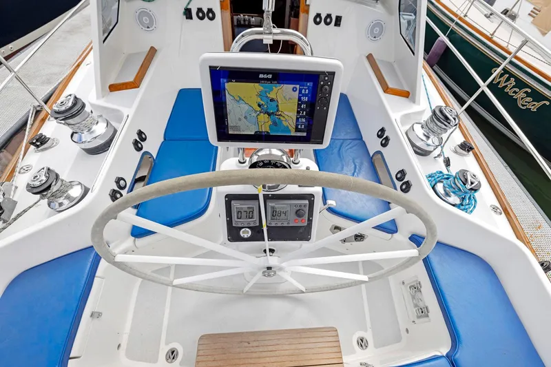 Slide: The Image of Cockpit of 2005 Morris 486 sailboat with navigation system and steering wheel. - 28