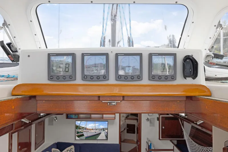 Slide: The Image of Interior view of a 2005 Morris 486 yacht cockpit with navigation instruments. - 31