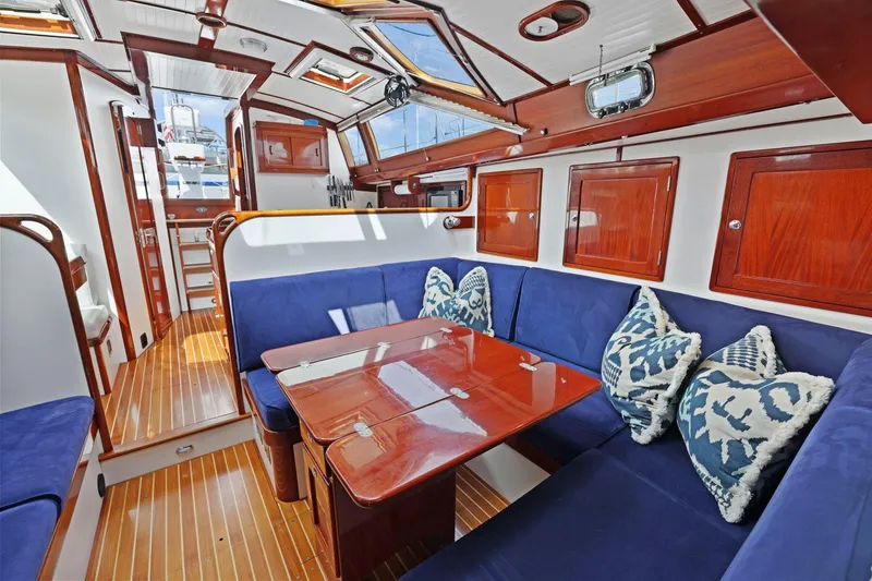 Slide: The Image of Luxurious 2005 Morris 486 yacht interior with blue seating and wooden accents. - 41