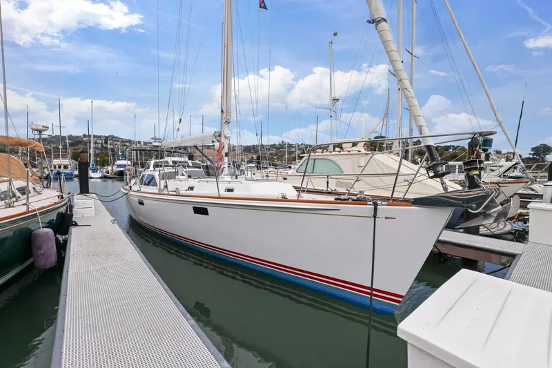Slide: The Image of Sailboat docked at marina, Morris 486, 2005 model, clear sky background. - 6