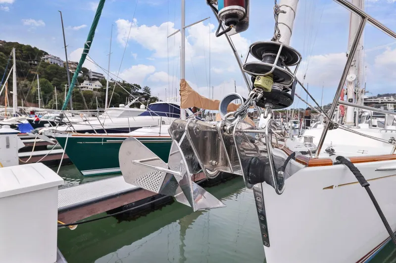 Slide: The Image of Sailboat anchored in marina, featuring Morris 486 model, 2005. - 7