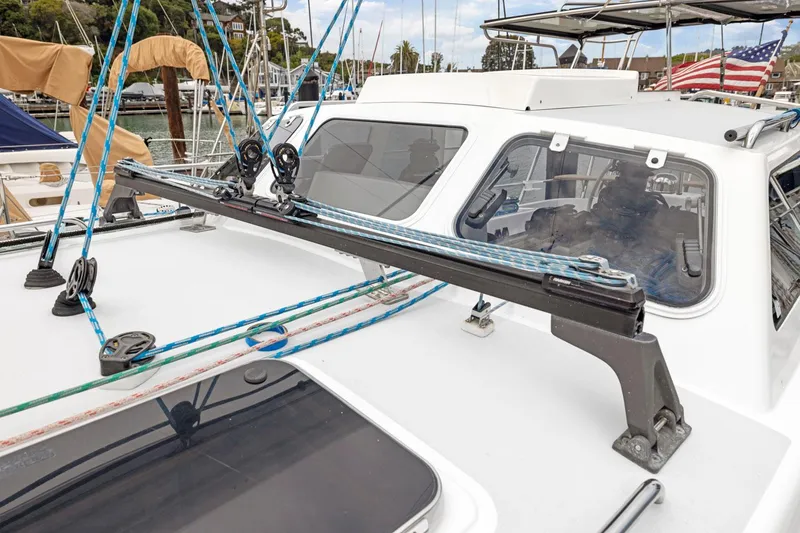 Slide: The Image of Sailboat deck with rigging and windows, Morris 486, 2005 model, docked in marina. - 9
