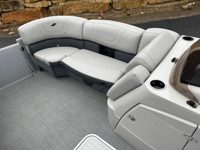 Slide: The Image of 2024 Starcraft MX 25 R boat interior with luxurious seating and modern design. - 6