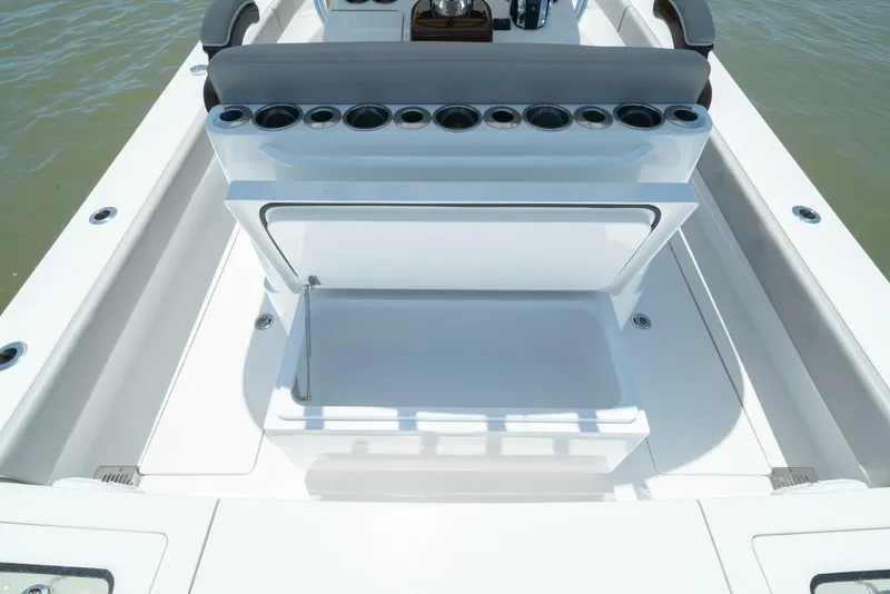 Slide: The Image of 2024 Valhalla Boatworks V-28 center console with rod holders and storage compartment. - 10