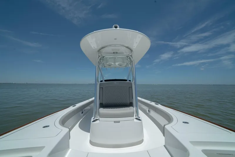 Slide: The Image of 2024 Valhalla Boatworks V-28 center console boat on calm water. - 13