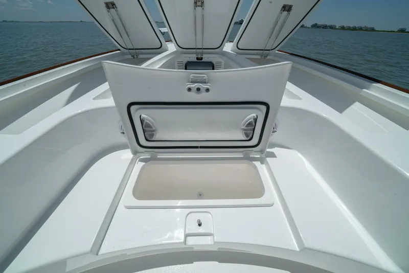 Slide: The Image of 2024 Valhalla Boatworks V-28 open storage compartments on deck. - 20