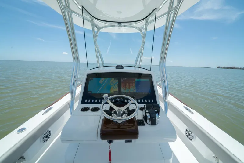 Slide: The Image of 2024 Valhalla Boatworks V-28 helm station with dual screens on calm water - 3