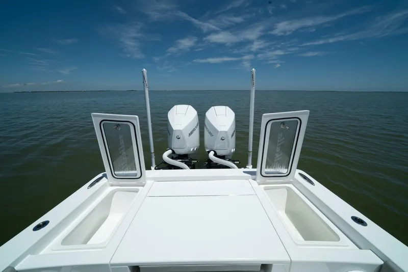 Slide: The Image of 2024 Valhalla Boatworks V-28 with dual outboard engines on open water. - 4