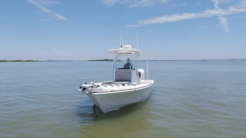Slide: The Image of 2024 Valhalla Boatworks V-28 on calm waters under a clear sky. - 48