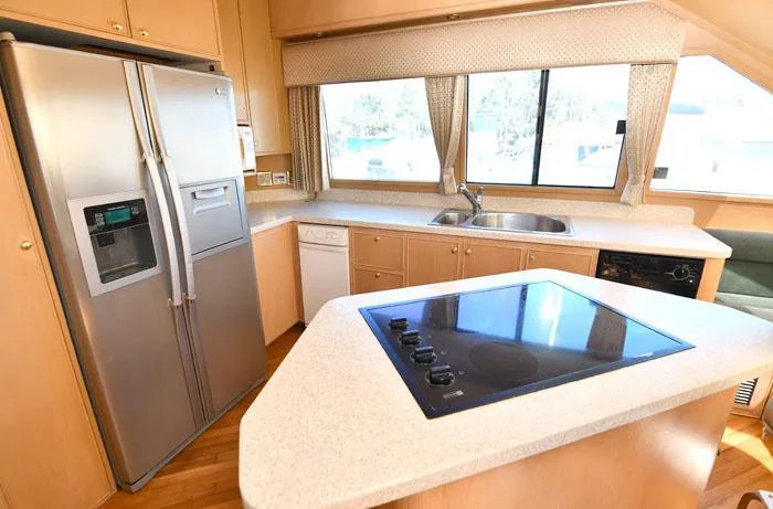 Slide: The Image of Modern kitchen interior of 1997 Forbes Cooper 74 Pilothouse yacht with appliances. - 10