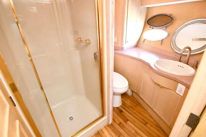 Slide: The Image of Luxurious bathroom in 1997 Forbes Cooper 74 Pilothouse yacht with shower and elegant fixtures. - 28