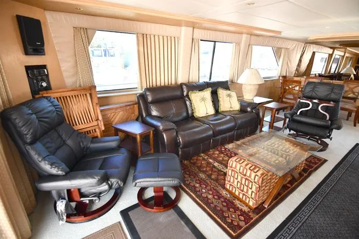 Slide: The Image of Luxurious interior of 1997 Forbes Cooper 74 Pilothouse yacht with leather seating and elegant decor. - 6