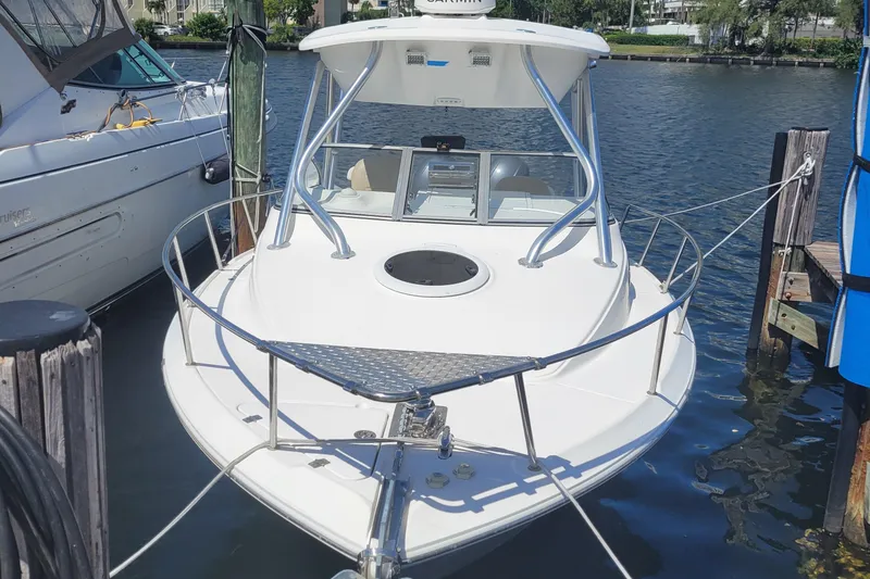 Slide: The Image of 2018 Sea Fox 256 Voyager docked at a marina. - 1