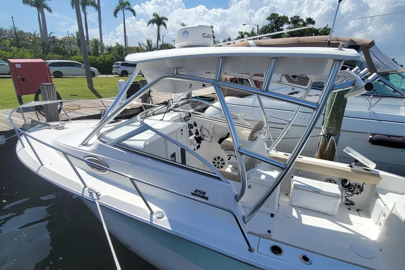 Slide: The Image of 2018 Sea Fox 256 Voyager boat docked at marina. - 2