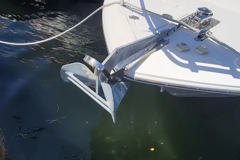Slide: The Image of 2018 Sea Fox 256 Voyager boat anchor at the bow in water. - 6