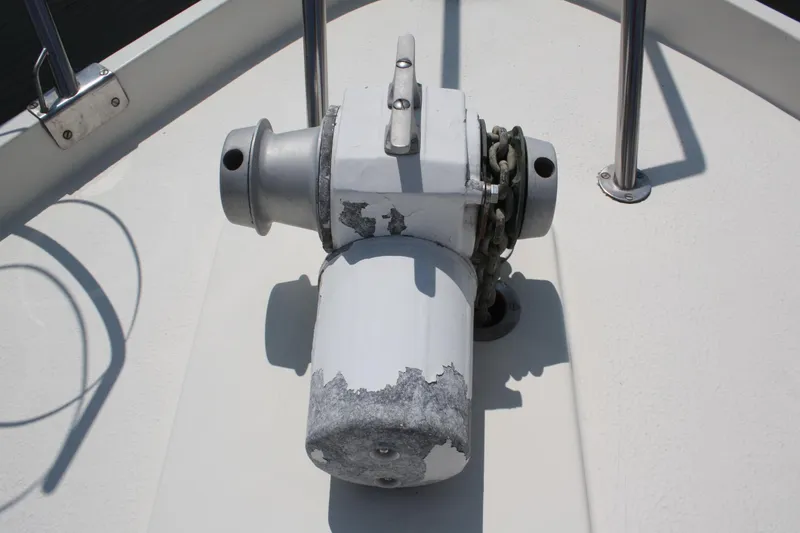 Slide: The Image of Anchor windlass on 1986 Birchwood 42 Empress boat deck. - 8