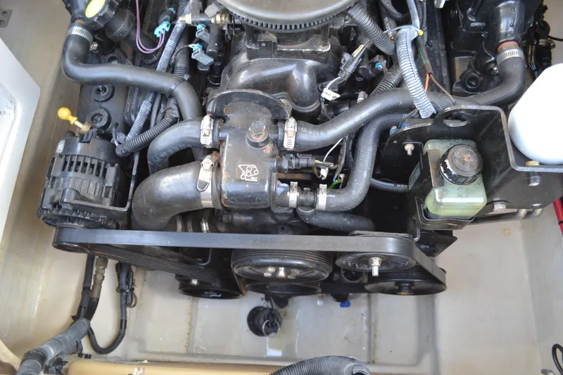 Slide: The Image of Engine compartment of a 2005 Sea Ray 240 Sundeck boat. - 19