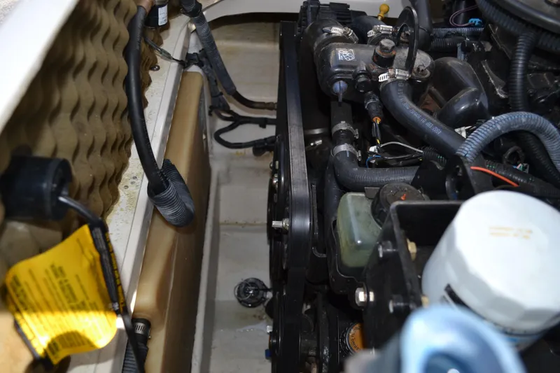 Slide: The Image of Engine compartment of a 2005 Sea Ray 240 Sundeck boat. - 23