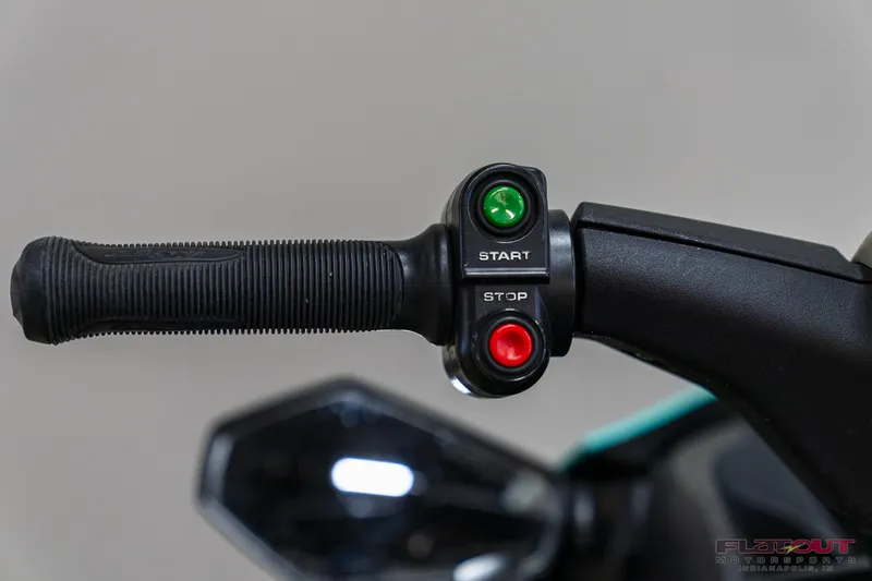 Slide: The Image of Close-up of 2020 Kawasaki STX 160X handlebar with start and stop buttons. - 13