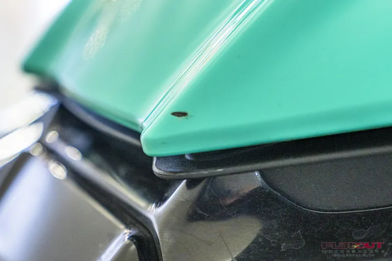 Slide: The Image of Close-up of 2020 Kawasaki STX 160X jet ski with minor paint chip. - 17