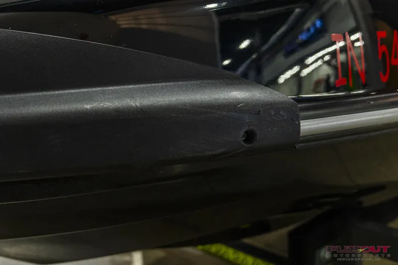 Slide: The Image of Close-up of a 2020 Kawasaki STX 160X jet ski hull in a showroom. - 18