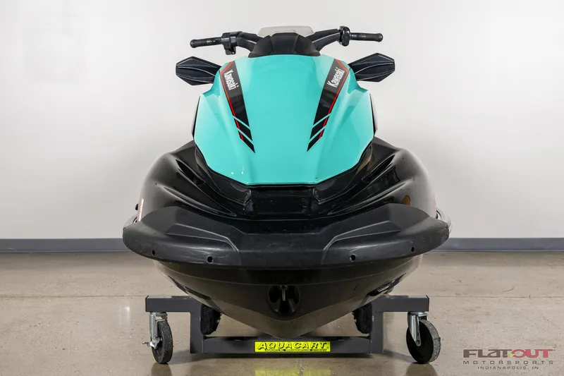 Slide: The Image of 2020 Kawasaki STX 160X jet ski on display in a showroom. - 5