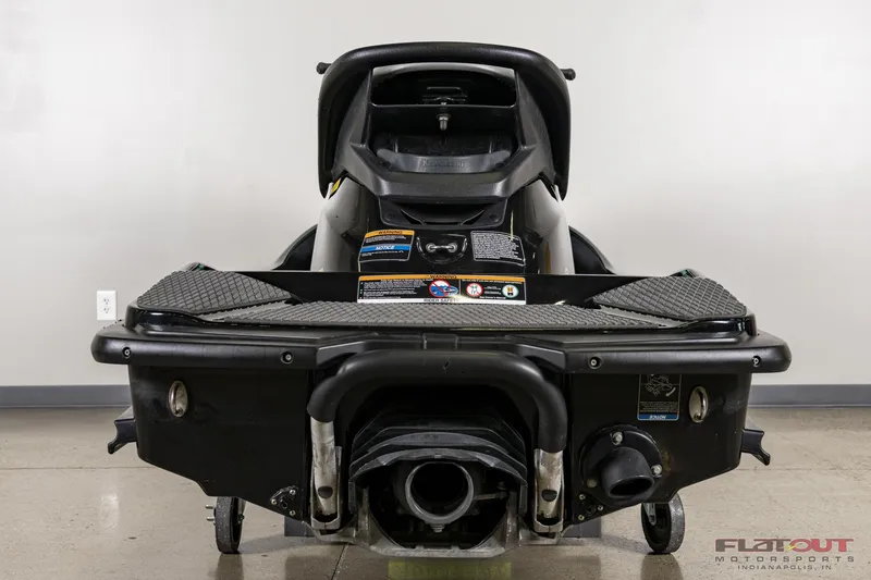Slide: The Image of 2020 Kawasaki STX 160X jet ski rear view in showroom. - 7