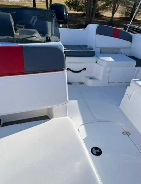 Slide: The Image of 2024 Tahoe T18 boat interior with seating and console. - 3