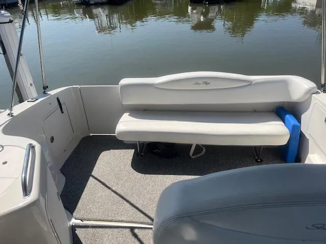 Slide: The Image of 2005 Sea Ray 280 Sundancer boat interior with seating and water view. - 18