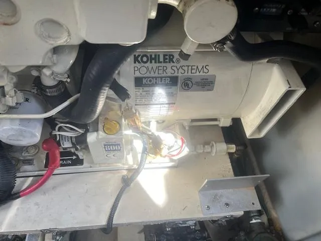 Slide: The Image of Kohler Power Systems generator in a 2005 Sea Ray 280 Sundancer boat engine compartment. - 27