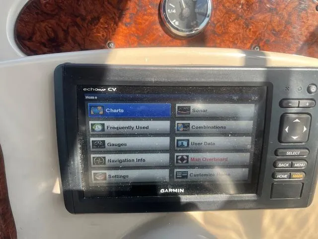 Slide: The Image of Garmin navigation system on 2005 Sea Ray 280 Sundancer boat dashboard. - 29