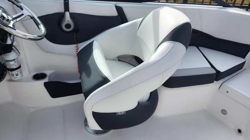 Slide: The Image of 2025 Regal 21 OBX boat interior with open storage compartment. - 29