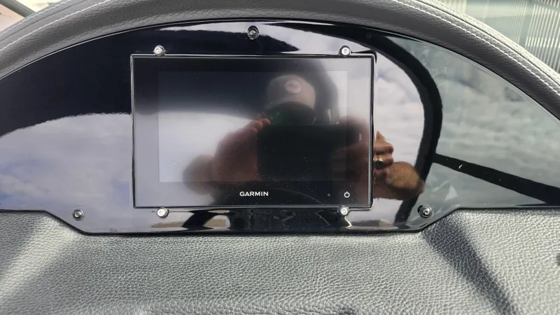 Slide: The Image of 2025 Regal 21 OBX boat interior with speakers and seating. - 31